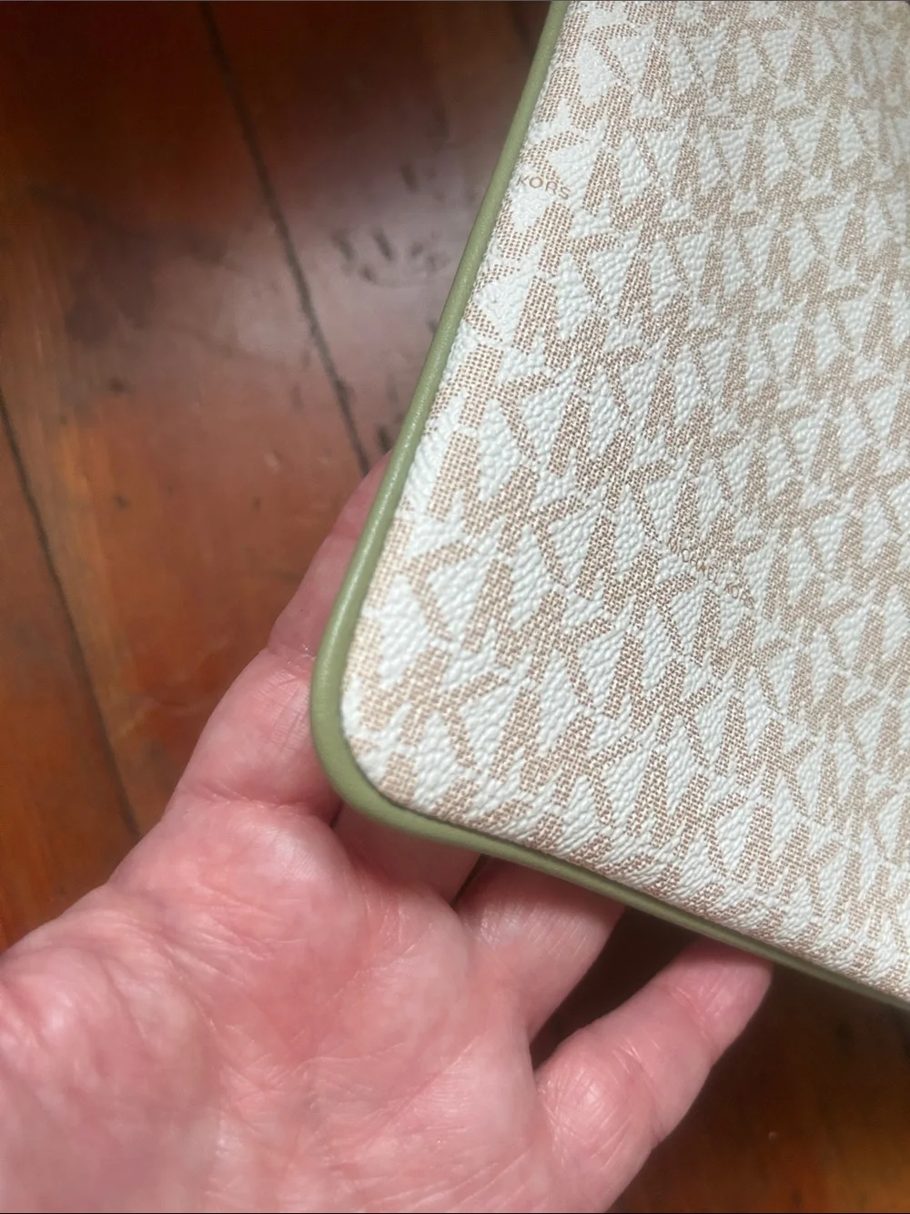 Michael Kors Cream Wristlet with Olive Center Stripe